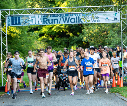 Runners from the 2026 "For Your Health" 5K Run/Walk & 1-mile Fun Walk are pictured beginning the race.